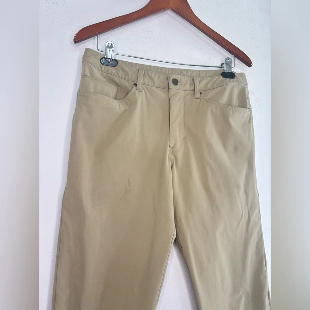 LULULEMON OLIVE GREEN ATHLETIC STYLE TROUSER PANTS SZ 31